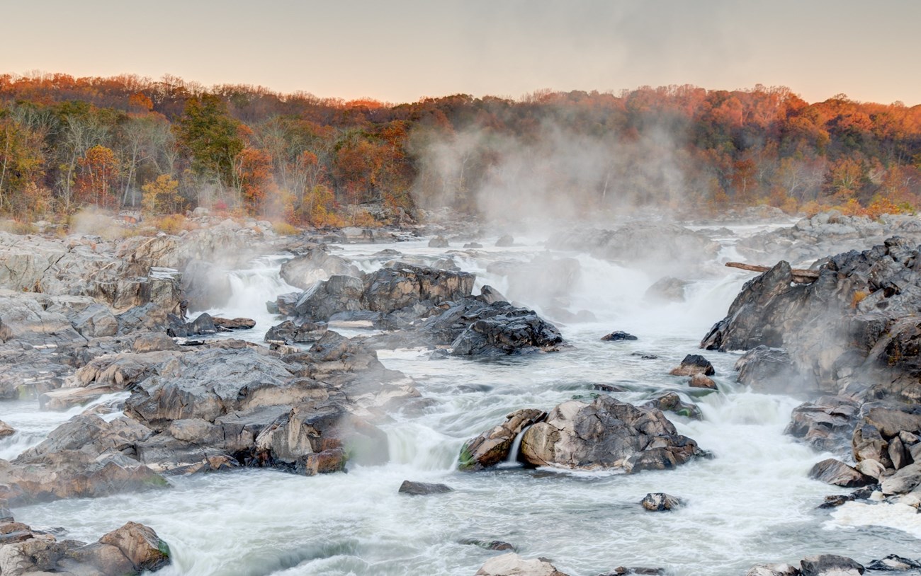 Rocky terrain with water rushing through 