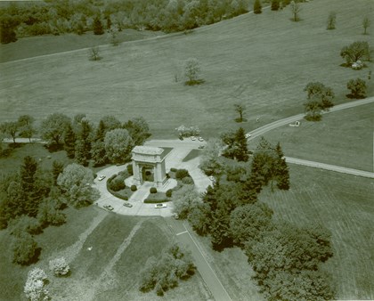 Aerial view of national memorial arch with cars driving around it