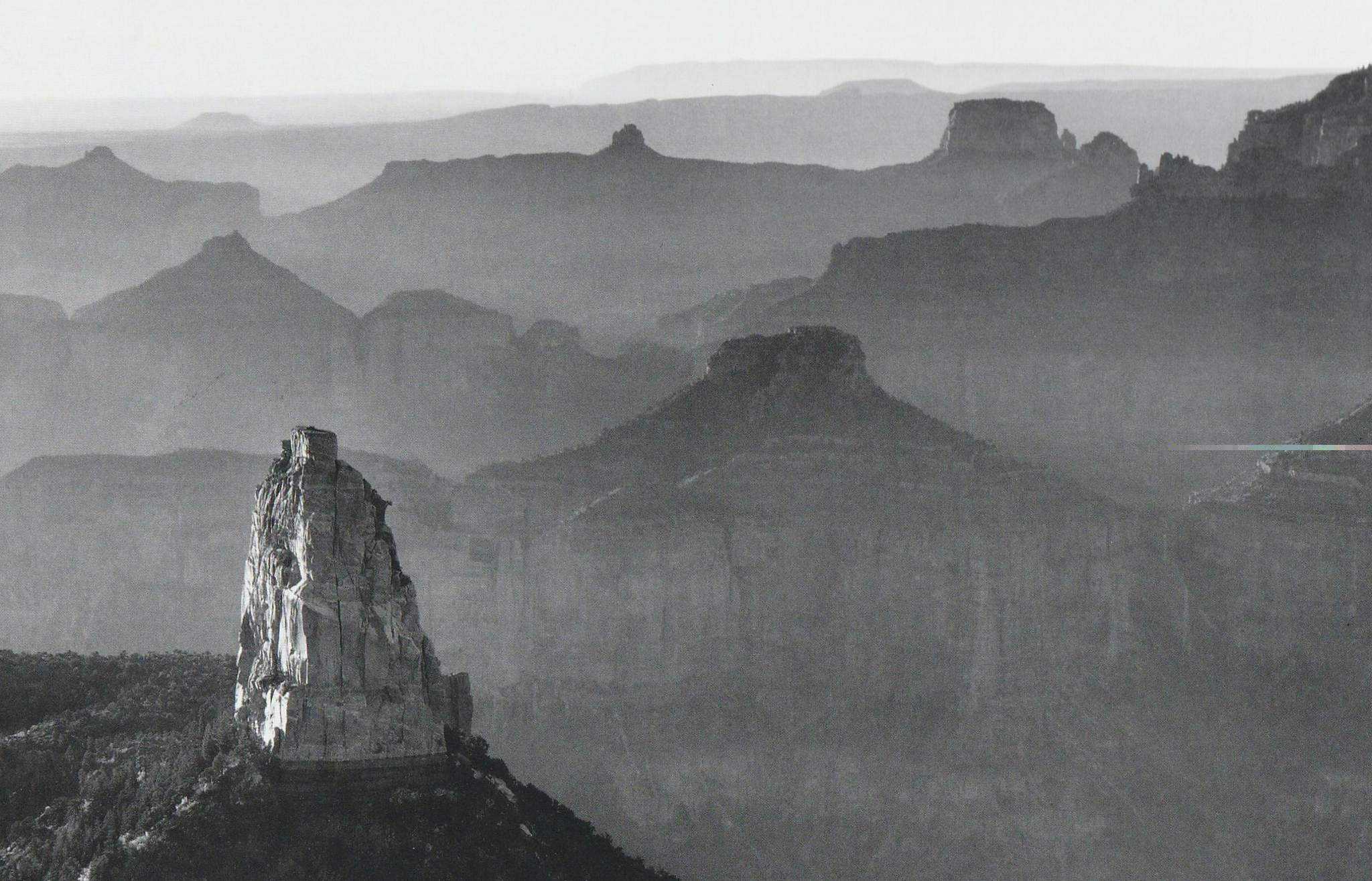 Photograph of canyon features in haze