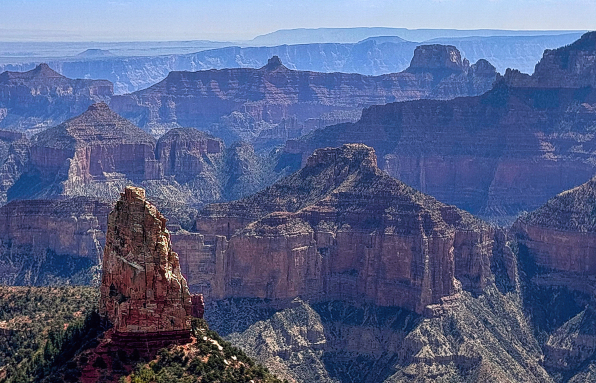 Photograph of canyon features in haze