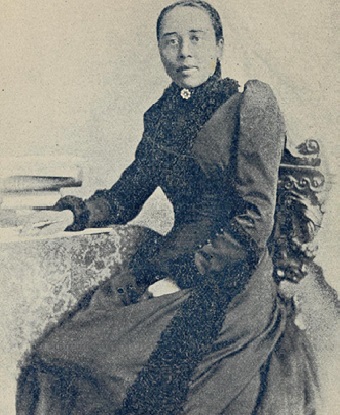 woman sitting for a photograph