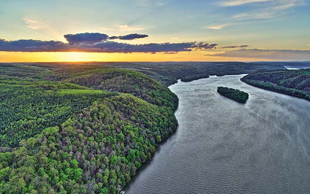 Susquehanna River and green landscape with sunset