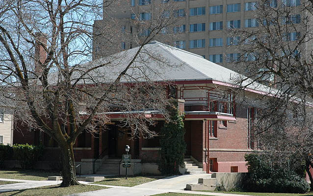 Exterior of the red brick building with Prairie style windows