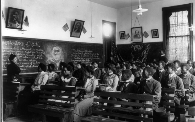 Tuskegee Institute students sit at desks