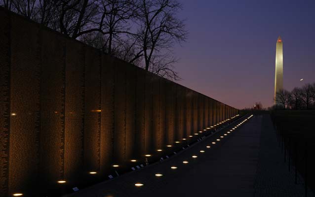 the Vietnam Veterans Memorial and Washington Monument at sunset