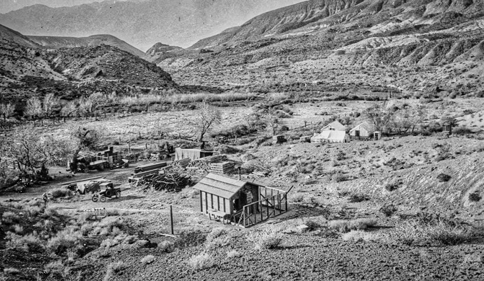 Farm buildings in small valley.