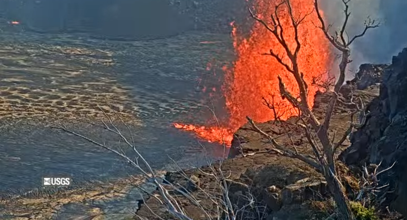 Webcam image of Halemaʻumaʻu crater with volcanic rock. No red lava is present in the crater.