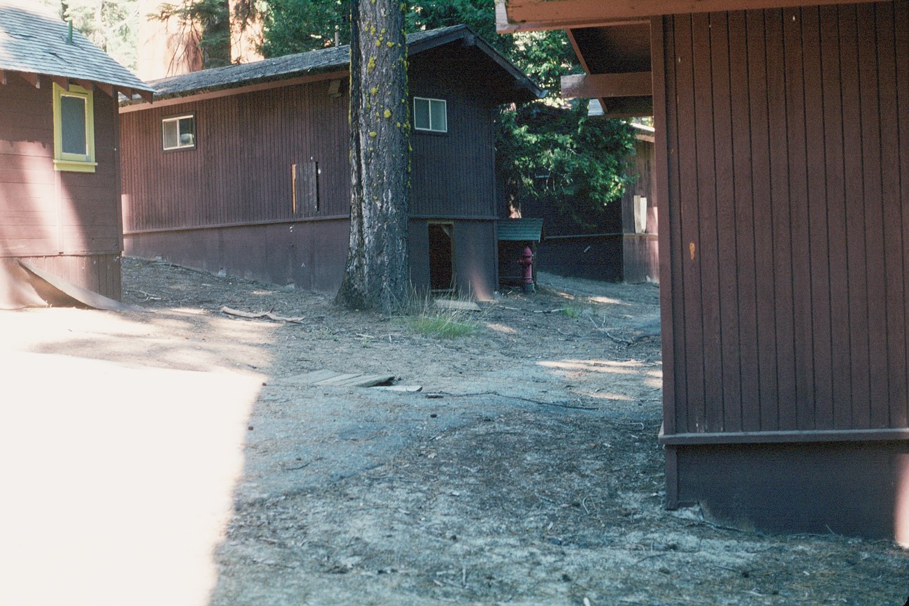 A view of buildings in the Lodge area before restoration