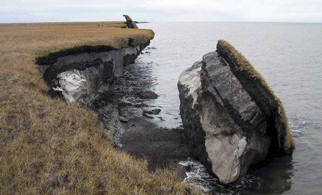 huge chunk of land that has broken off and fallen into the ocean