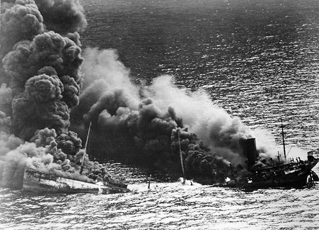 Dixie Arrow, a tanker, burns off the coast of the Outer Banks after being torpedoed