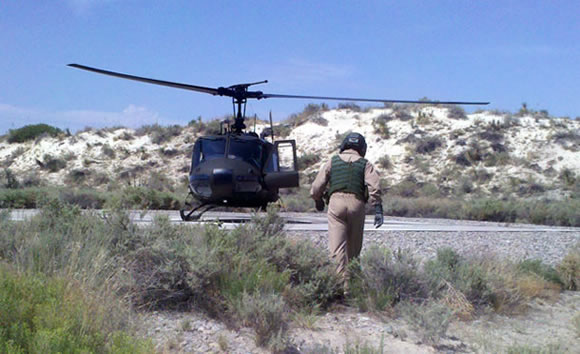 Black helicopter in the desert