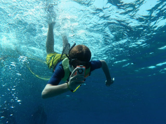boy snorkeling underwater