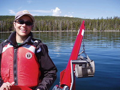 Research on Yellowstone Lake with Ponar sampler and winch attached to a boat