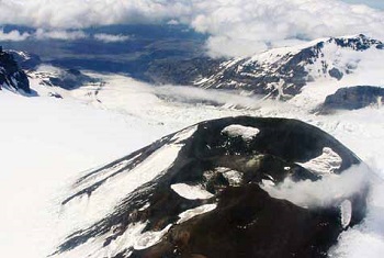 aerial view of a snowy volcano