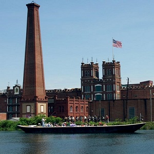 Replica canal boat passes Sibley Mill.