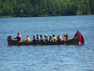 Visitors in canoe