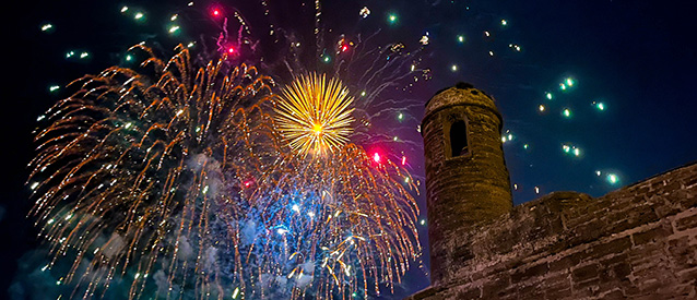 Castillo de San Marcos with fireworks behind.