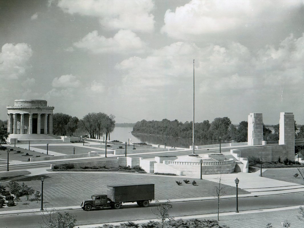 The Clark memorial and bridge approach with agriculture truck in foreground. 