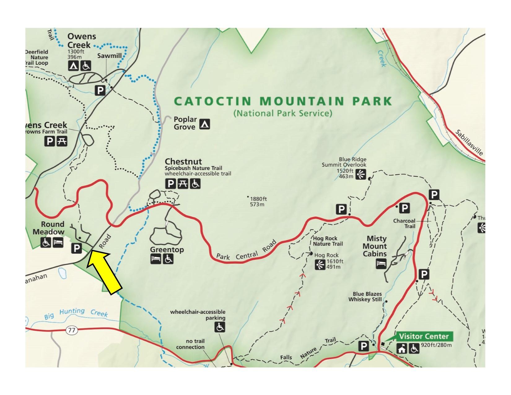 Park map with yellow arrow indicating parking area 
