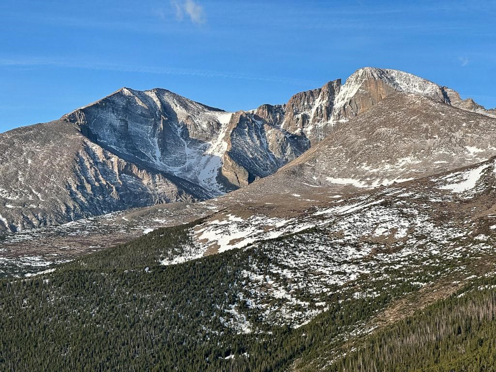 Snow dusts the surface of Longs Peak and Mount Meeker
