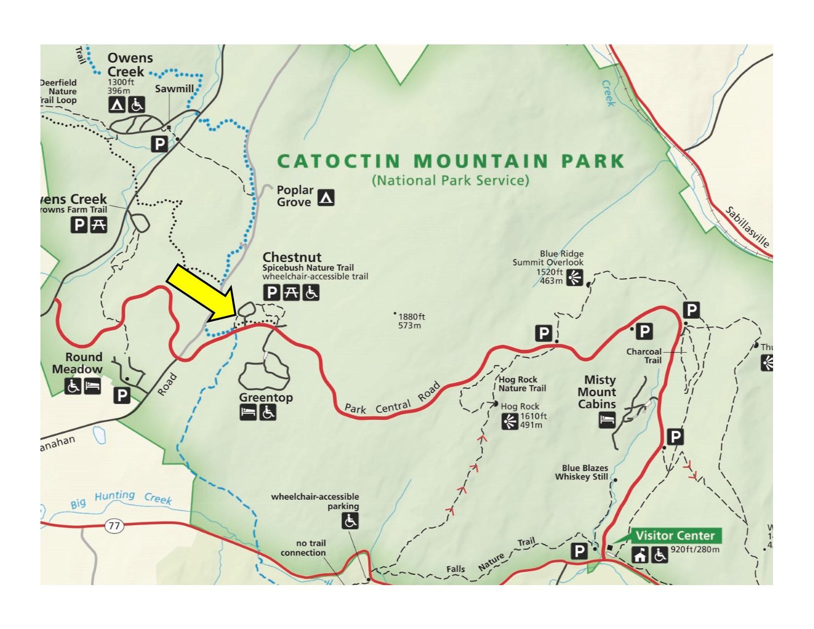 Park map with yellow arrow indicating location of parking area. 