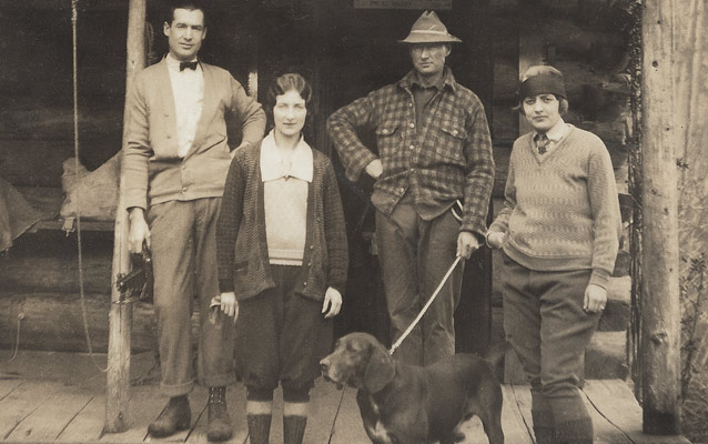Local Port Angeles residents pose in front of Humes ranch more than twenty years after the Humes brothers constructed it
