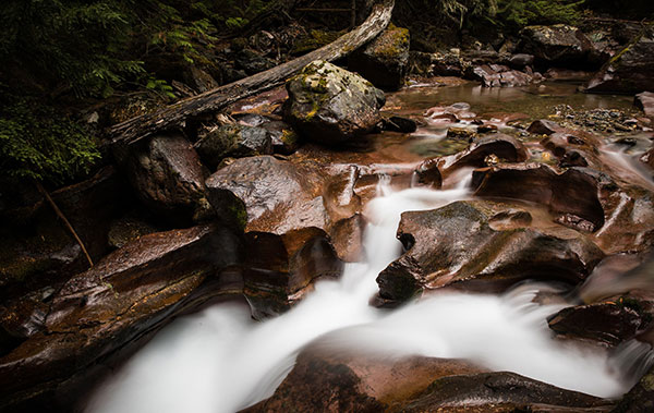 water rushes through rock