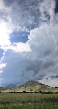 A storm builds over the park's mountains