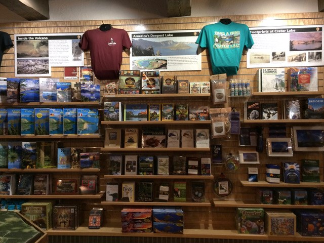 A wall of products in the Crater Lake Natural History Association bookstore