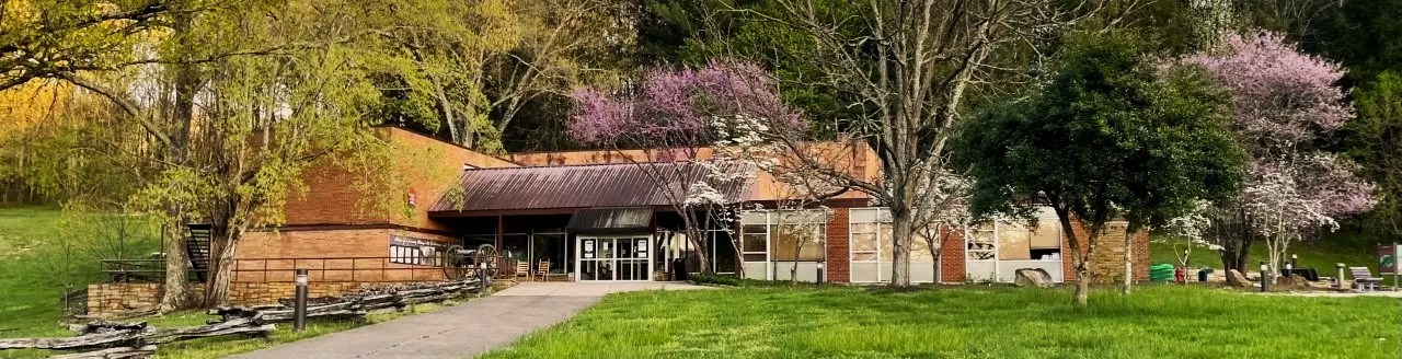 Visitor center in spring with dogwood and redbud trees blooming