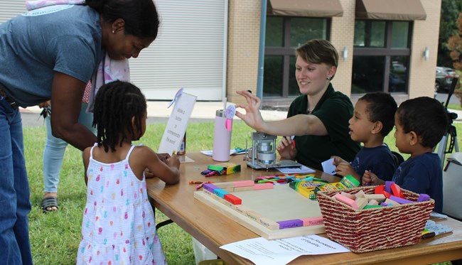 young visitors participate in activities during a special event