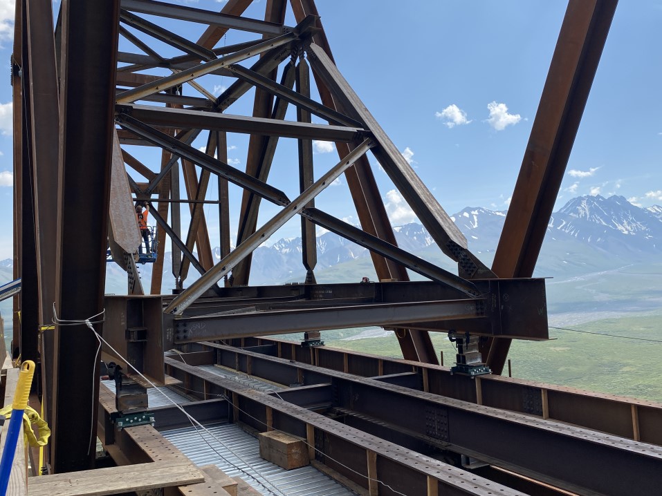 A few bays of a smaller truss sit inside a larger truss.