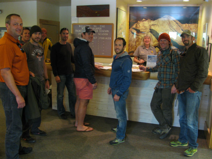 A climbing team checks in for their orientation at the ranger station