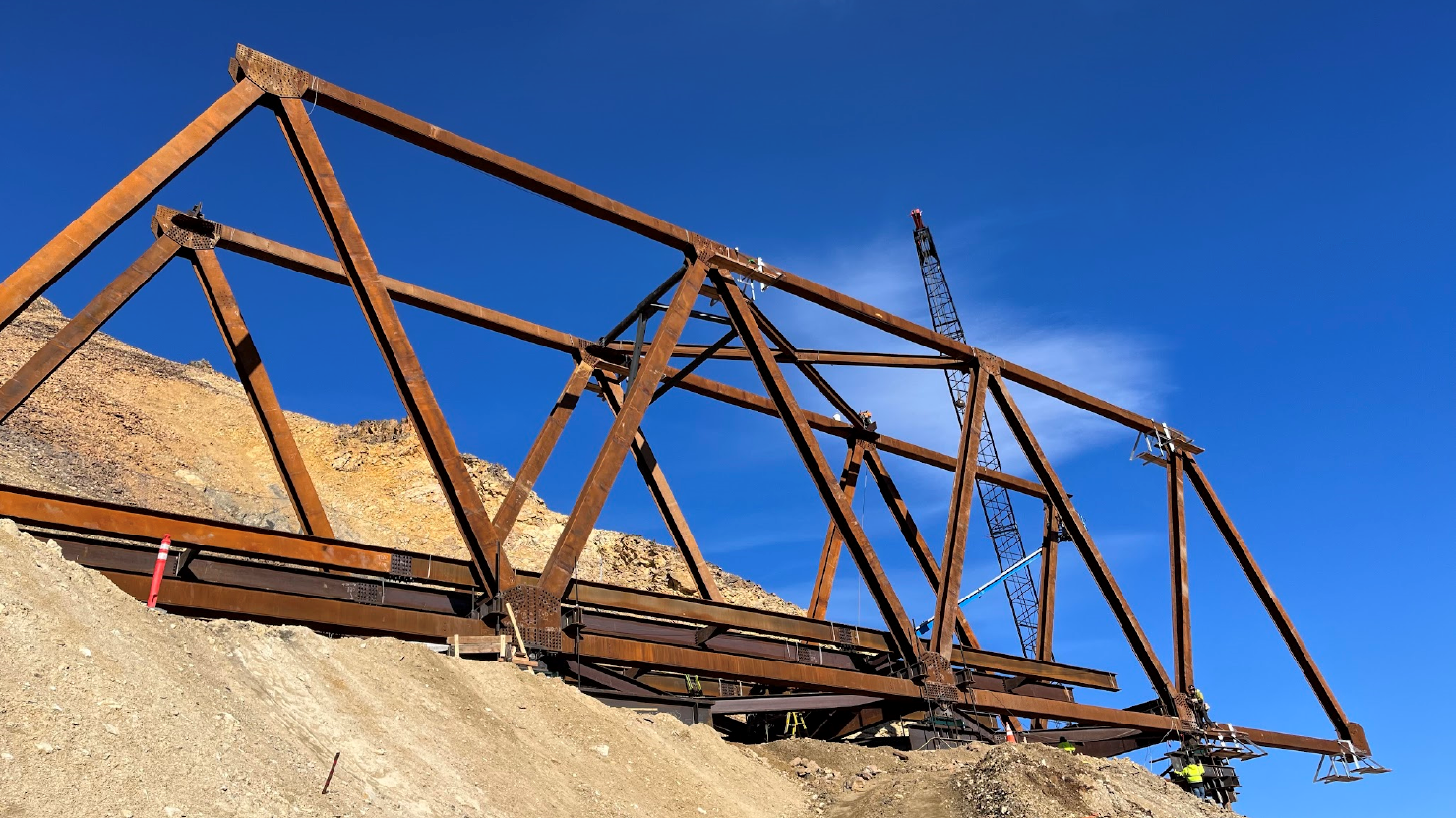 Erected steel truss bays