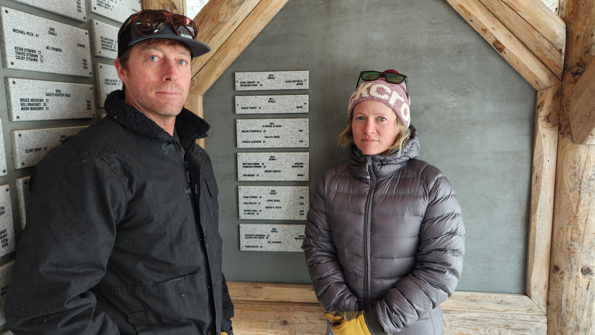 Rangers Tucker Chenoweth and Chrissie Oken after placing the plaque honoring the lost climbers from the 2024 season