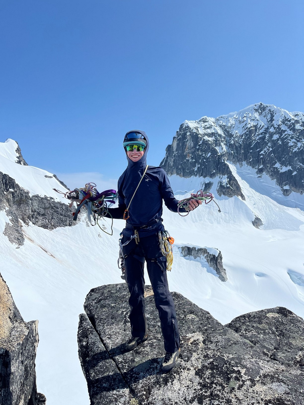 Ranger displays old rappel anchors removed or replaced during patrol