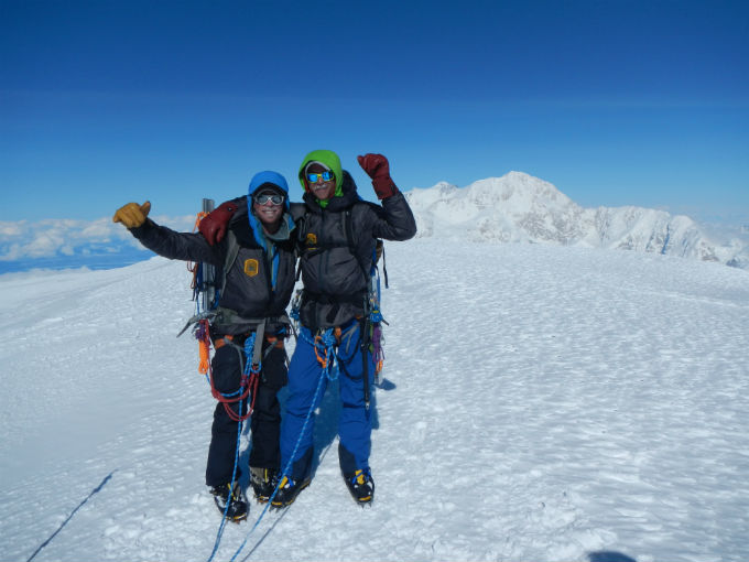 Two climbers on summit of Mount Foraker
