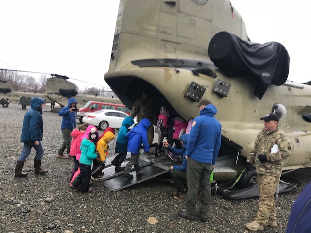 Talkeetna Elementary kids enter the Chinook cargo hold