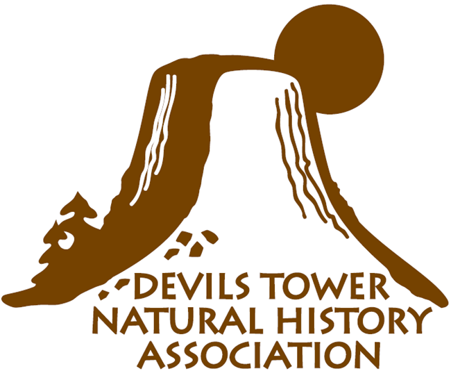 logo of association featuring an image of Devils Tower