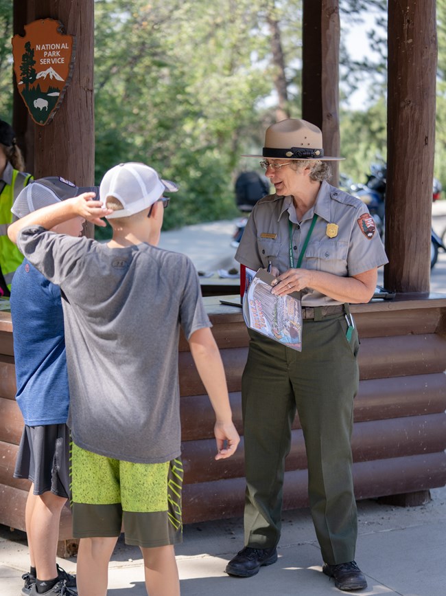 Ranger giving junior ranger instruction