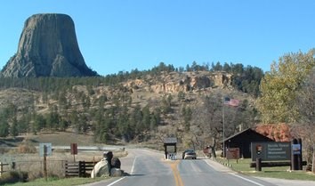 A vehicle goes through the entrance station of Devils Tower National Monument