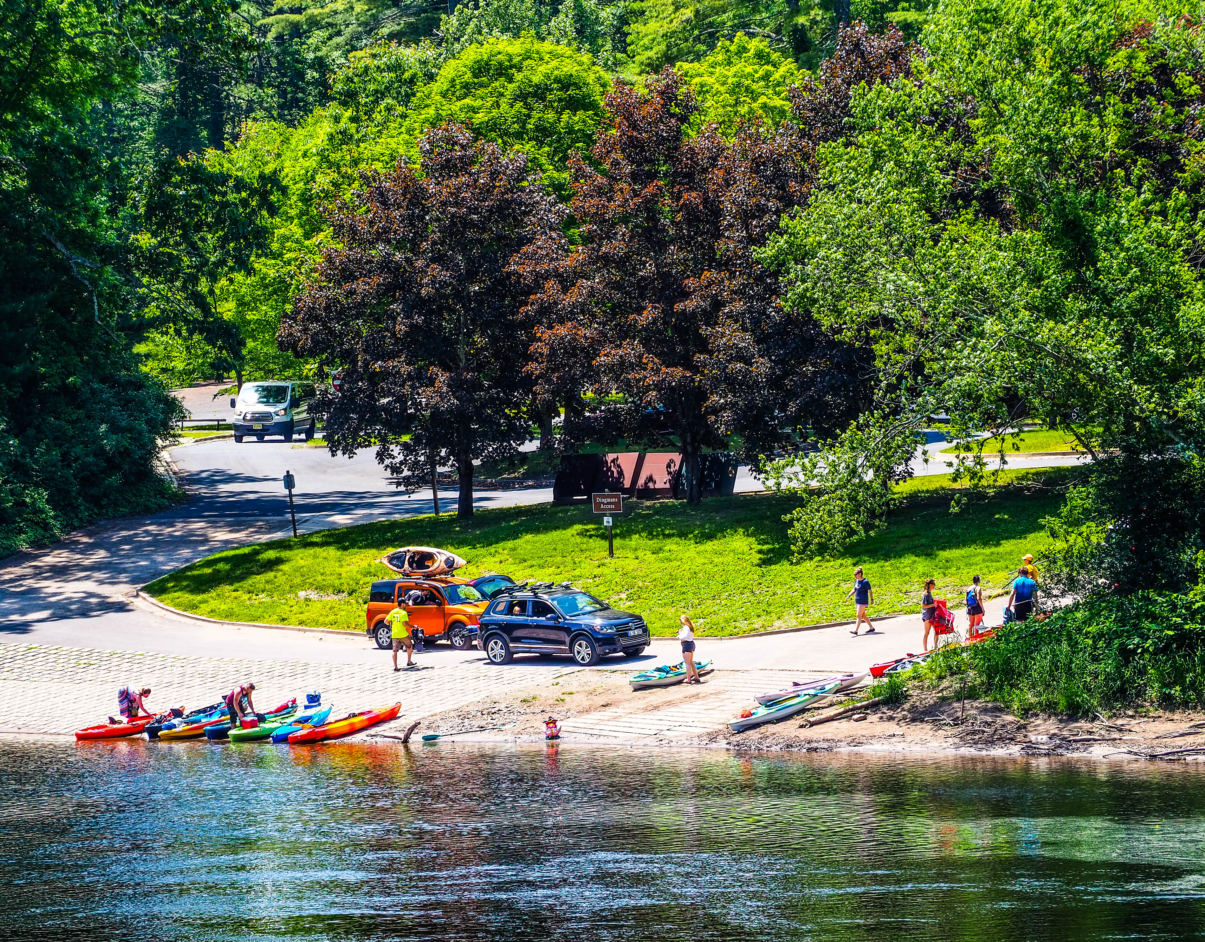 People loading their kayaks onto the Dingmans boat launch.