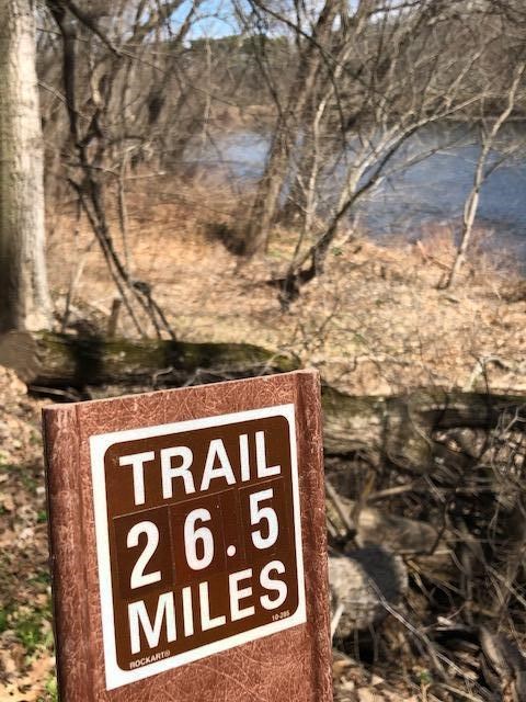 A mile marker along the McDade Trail with the mileage 26.5.