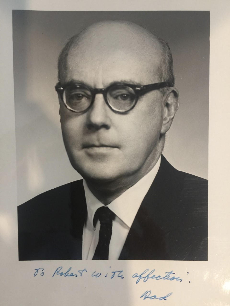 Black and White Photograph of Robert McCormick, wearing glasses