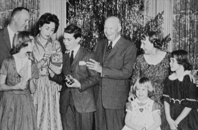 Black and white image of the Eisenhower family in front of a Christmas tree