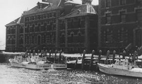 Coast Guard boats in front of the hospital complex c. 1952.