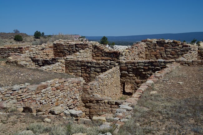 A pueblo structure overlooking a valley