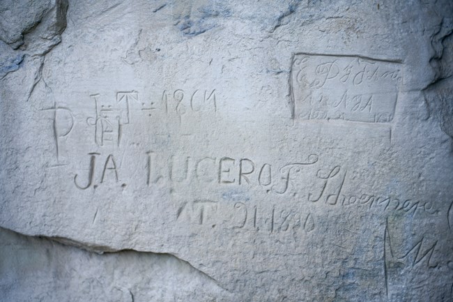 Multiple inscriptions on a rock face