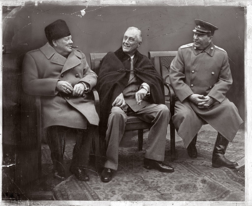 Three men, seated