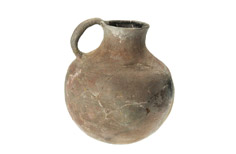 Aged cracked jug with neck and handle.